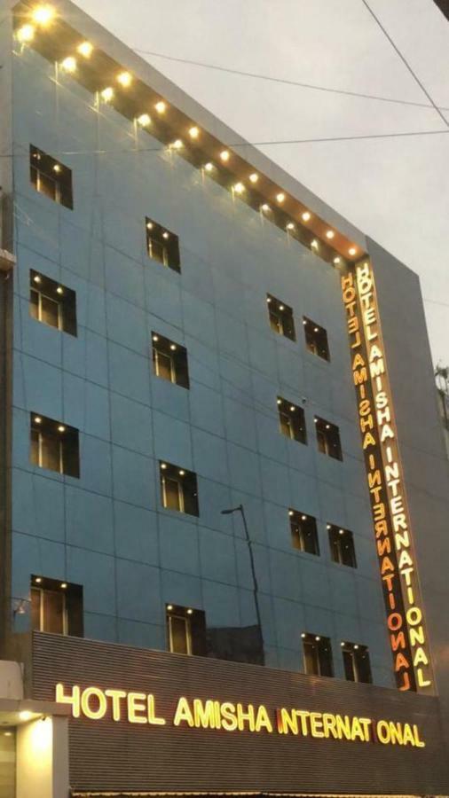 Hotel Amisha International Surat Exteriör bild